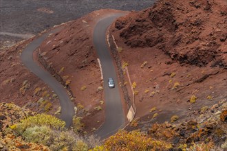 Curvy roads at the Lomo Negro viewpoint on the southwest coast of El Hierro. Canary Islands