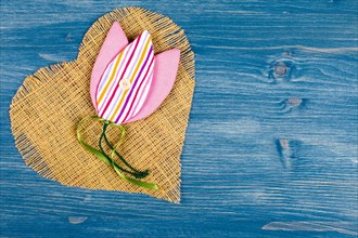 Linen heart on blue background