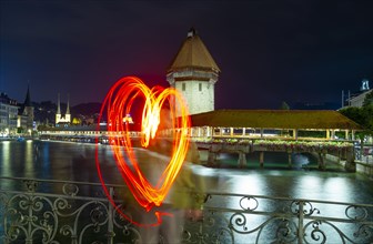 City of Lucerne with Chapel Bridge and Heartshape at Night in Switzerland