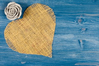 Linen heart on blue background