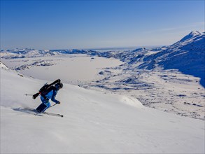 Ski mountaineers on the descent