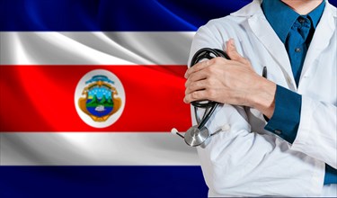 Doctor with stethoscope on Costa Rica flag. Health and care with flag of Costa Rica. Costa Rica national health concept