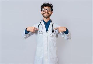 Smiling doctor pointing at himself isolated. Satisfied doctor pointing at himself