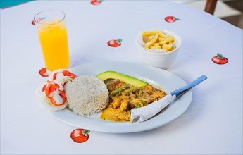 Top view of a traditional breakfast served on the table. Traditional breakfast with orange juice served on the table