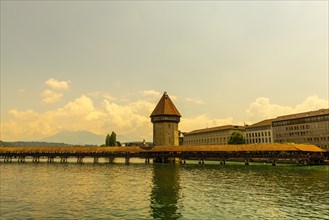 City of Lucerne with Chapel Bridge Tower in a Sunny Day in Switzerland