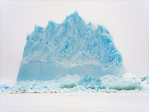 Iceberg in the frozen Kong Oscar Fjord