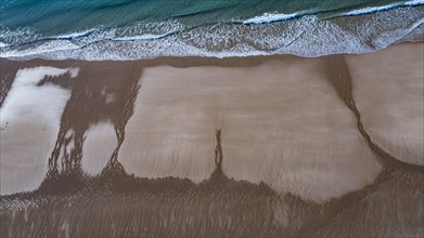 Whimsical formations on the sandy beach