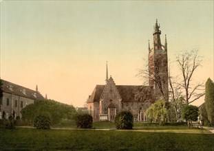 Church and grey house in the park of Woerlitz
