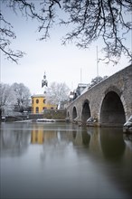 City panorama on a river with ice and snow. Lahn