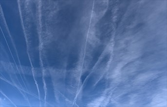Contrails in the blue sky