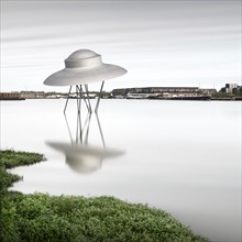 Minimalist long exposure of a UFO. Artwork Le Vaisseau Spatial in the port of Bordeaux
