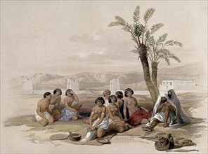 Male and female Ethiopian slaves resting