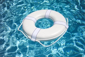 White life buoy in pool