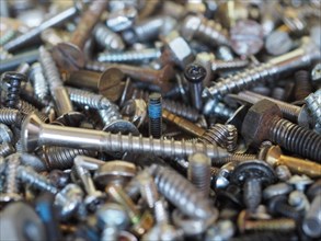 Industrial steel hardware bolt nut screw washer useful as a background