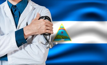 Doctor with stethoscope on Nicaragua flag. Health and care with the flag of Nicaragua. Nicaragua national health concept