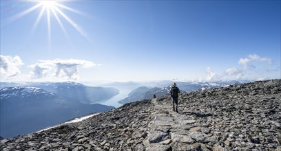 Hikers climbing to the top of Skala