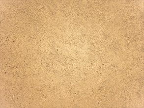 Yellow plaster wall texture background