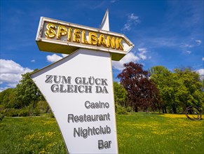 Information sign for the casino in the spa gardens of Bad Homburg vor der Hoehe