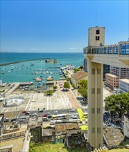 Panoramic view of the bay of All Saints with boats and Lacerda elevator in the city of Salvador in Bahia on a sunny day.