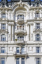 Baroque facade of a historic building on left Wienzeile