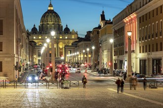 Street scene on Via della Conciliazione to St. Peter's Basilica in the evening light