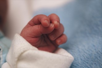 Close-up of a hand of a newborn child