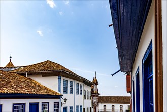 Facade of old colorful colonial houses and church in the historic town of Diamantina in Minas Gerais state
