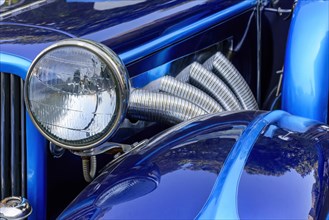 Detail of old blue car in perfect condition