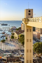 View of the bay of All Saints and Lacerda elevator in the famous city of Salvado at sunsetr