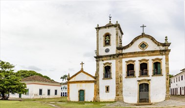 Historic church facade and surrounding houses in the ancient city of Paraty on the south coast of the state of Rio de Janeiro