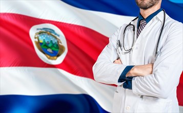 Costa Rica national health concept. Doctor with crossed arms on Costa Rica flag