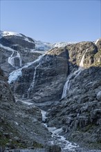 Waterfalls at the glacier tongue Kjenndalsbreen