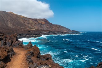 Cliffs from the volcanic trail in the village of Tamaduste on the coast of the island of El Hierro