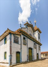 Facade of a time-worn baroque church in the historic town of Diamantina in the state of Minas Gerais