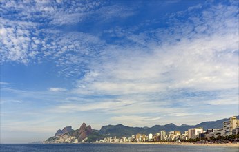 Panoramic view of the beaches of Ipanema and Leblon in Rio de Janeiro with the mountains in the background