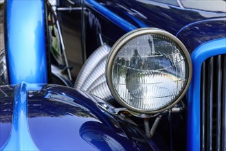 Detail of antique blue car in perfect condition
