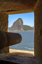 Cannon at the Fortress of Santa Cruz directed to the Guanabara Bay entrance and responsible for the defense of Rio de Janeiro at the time of the empire. You can see the Sugar Loaf hill in the backgrou...