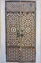 Portal with wood and mother-of-pearl mosaic inside the ancient and famous Topkapi Palace in Istanbul
