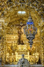 Altar of old and historic baroque church gold leaf in the city of Salvado in Bahia