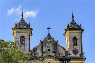 Baroque style historic church towers with their bells in Ouro Preto