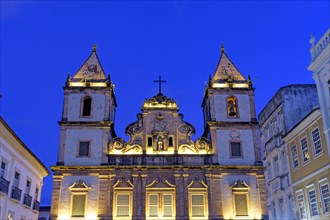 Illuminated facade of an ancient and historic church located in Salvador