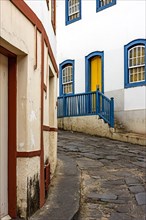 Street with cobblestones and houses with colonial architecture in the old and historic city of Diamantina in Minas Gerais