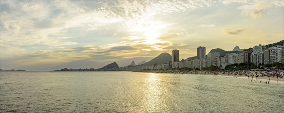 Panoramic view of Leme and Copacabana beaches in Rio de Janeiro with the mountains in the background