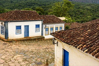 Streets and slopes with cobblestones and old colonial-style houses in the city of Tiradentes