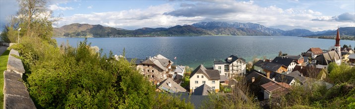 View over the village Attersee am Attersee and the evangnlical church to the lake Attersee
