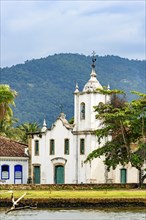 White church near the sea on the south coast of the state of Rio de Janeiro founded in the 17th century