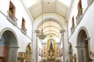 Interior and altar of a brazilian historic ancient church from the 18th century in colonial architecture in the city of Paraty