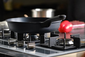 Low angle view of frying pan on a modern gas stove