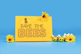 Save the Bees sign with felt bees and yellow flowers