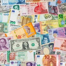 Money banknotes euro dollars currencies finances on travel background square pay pay banknotes in Stuttgart